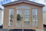 Featured Offer: 2018 | 3 Bedrooms Delta Oakwood Sandalwood Canexel Cladding - 40 x 13 with 2 bedrooms - Washing Machine / Dishwasher and a BATH