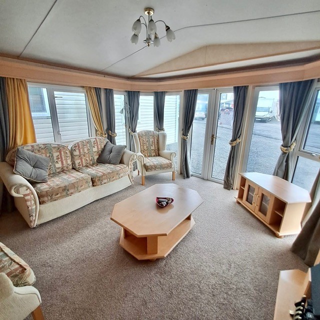 BK BLUEBIRD SAVE THOUSANDS - IT'S GOT A BATH - BK BLUEBIRD SENATOR 39 X 12  2 BEDROOM DOUBLE GLAZING CENTRAL HEATING FRONT OPENING PATIO DOORS  For Sale Thumb