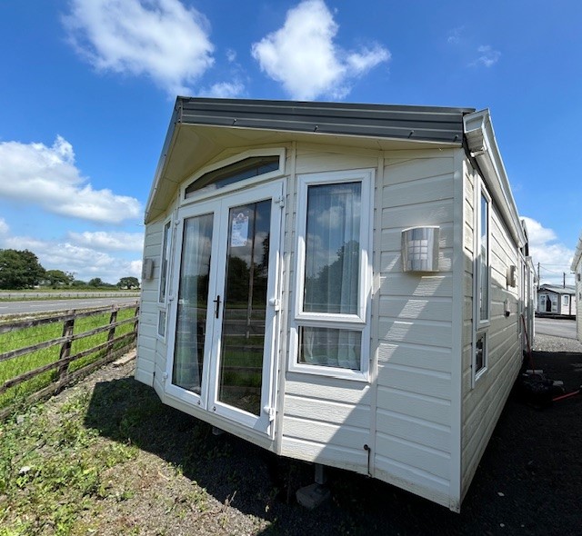 WILLERBY  3 BEDROOMS -  WILLERBY VOGUE 42 X 13 - DOUBLE GLAZING CENTRAL HEATING & GALVANISED CHASSIS - FRONT OPENING FRENCH PATIO DOORS For Sale Thumb