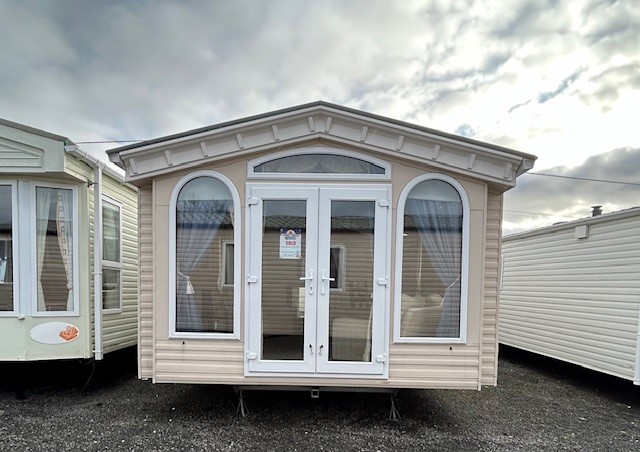 WILLERBY VOGUE CLASSIC - 38 X 12 WITH 2 BEDROOMS - DOUBLE GLAZING & CENTRAL HEATING & FRONT OPENING PATIO DOORS For Sale Thumb